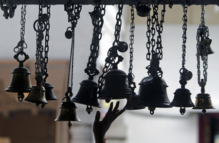 Ghanta is sounded before the actual puja and worship begins during Hindu Puja at  temples